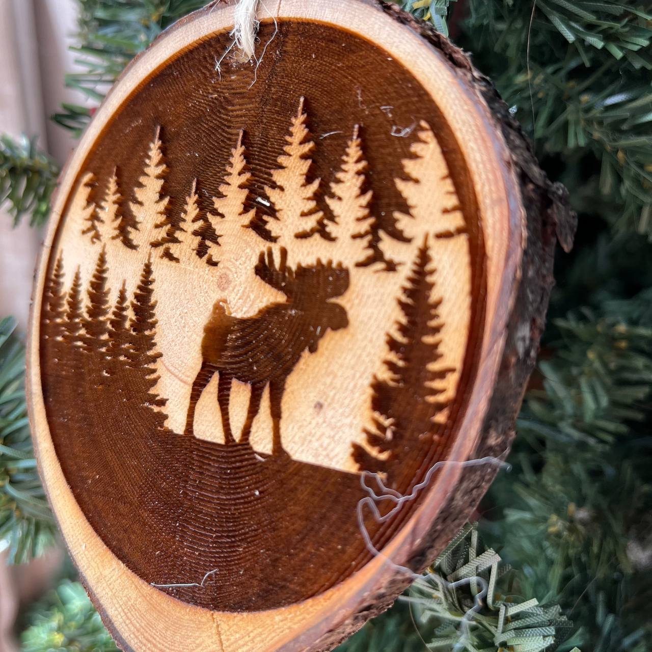 Moose in Forest Engraved Pine Wood Slice Ornament – Rustic Wildlife Tree Decor – Locally Sourced Handcrafted 3.25"-4" Round Ornament