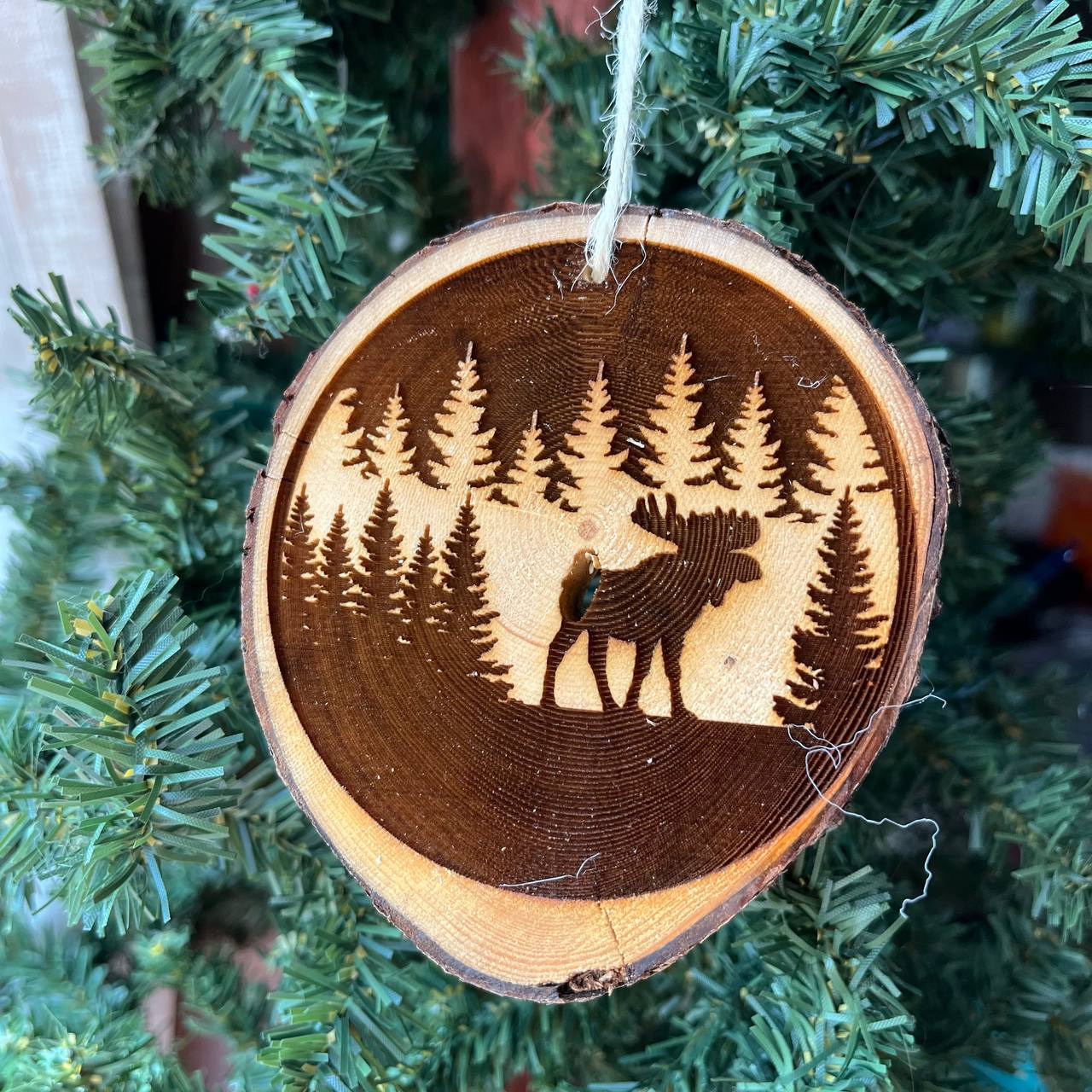 Moose in Forest Engraved Pine Wood Slice Ornament – Rustic Wildlife Tree Decor – Locally Sourced Handcrafted 3.25"-4" Round Ornament