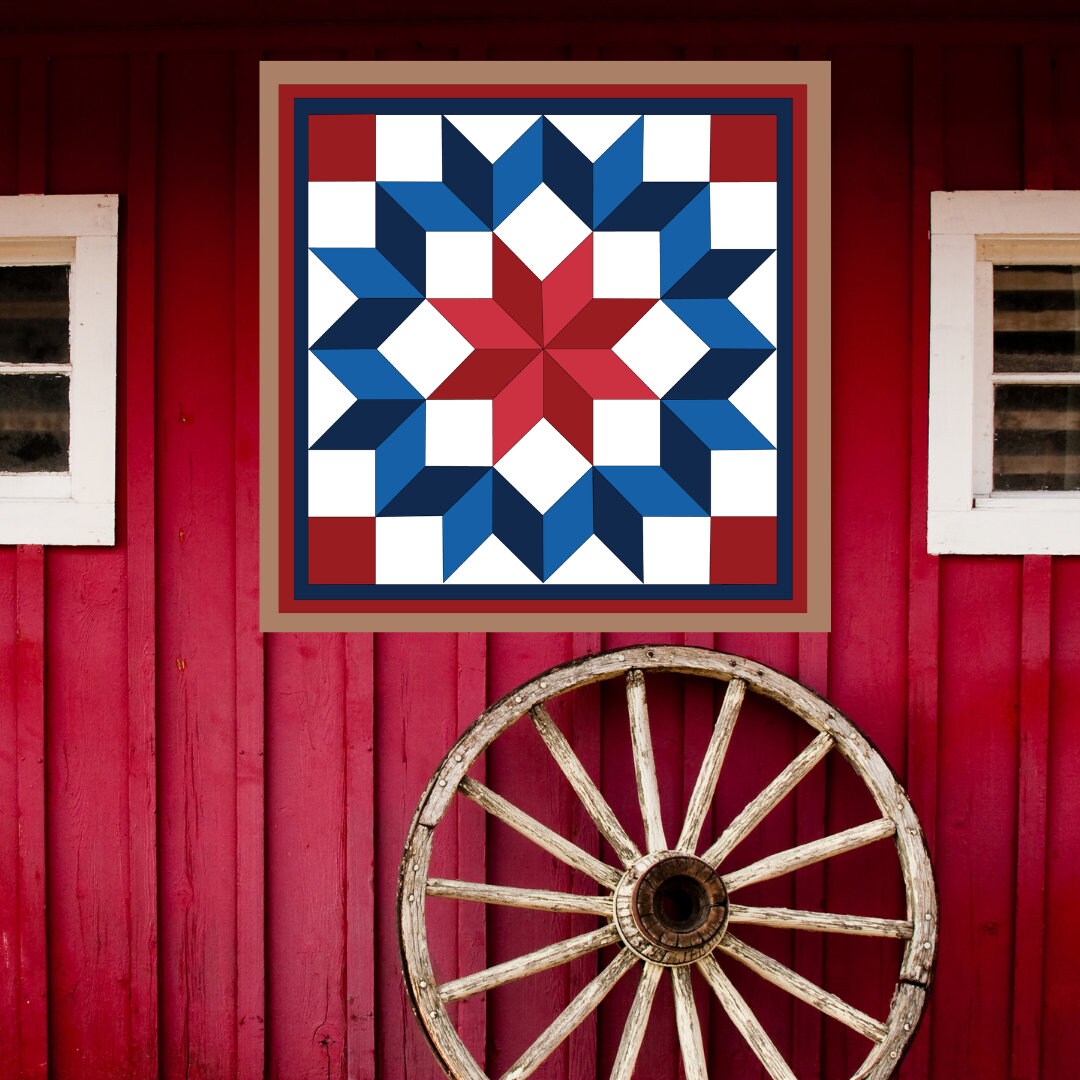 Carpenter Barn Quilt Pattern displayed on a rustic red barn with a vintage wagon wheel, showing the finished painted barn quilt outdoors.