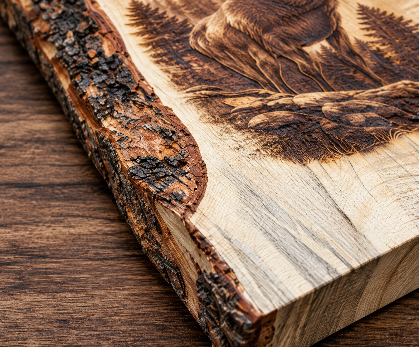 Close-up of a rustic live-edge wooden board with bark on one side, featuring a detailed brown burned or engraved animal and forest design on the top surface, placed on a wood tabletop.