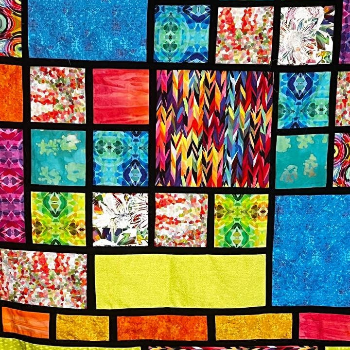 Close-up of stained glass quilt design