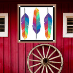 Feathers Barn Quilt Pattern displayed on a red barn with rustic wagon wheel, showing how the finished painted barn quilt looks outdoors.