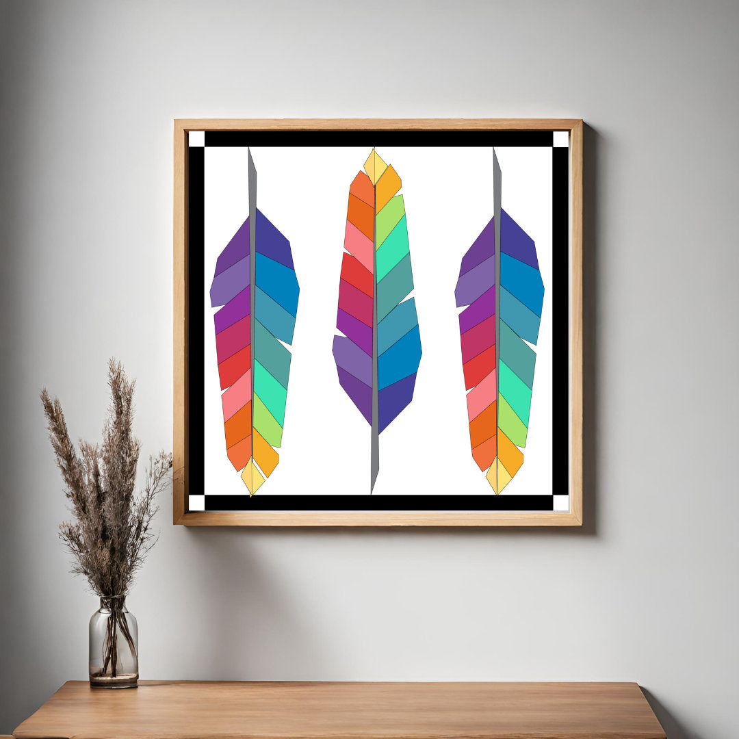 Framed Feathers Barn Quilt Pattern displayed as colorful farmhouse wall art in a modern living room. Printable digital download for DIY painted barn quilts.