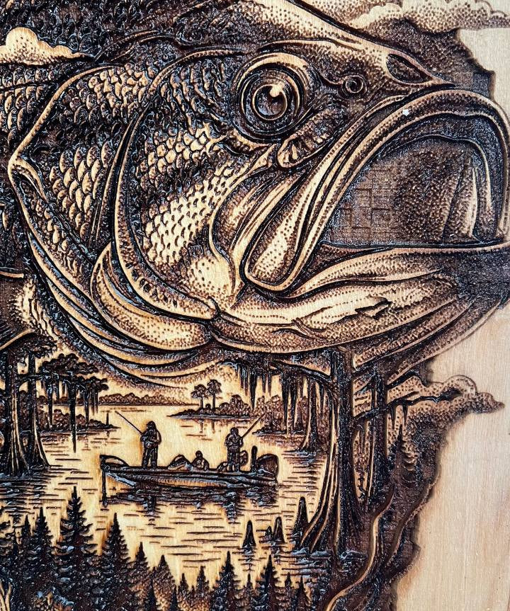 Wooden carving of a fish with a scenic background
