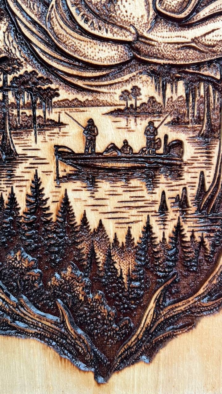 Wooden carving of a scene with people in a boat on water surrounded by trees