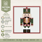 Digital pattern file preview for a nutcracker quilt design, showing a full-color vector illustration of a nutcracker with green, pink, white, and brown details. The left side lists features like full color, trace pattern in 3 sizes, grid pattern, instruction PDF, and instant download on a light wood-textured background.