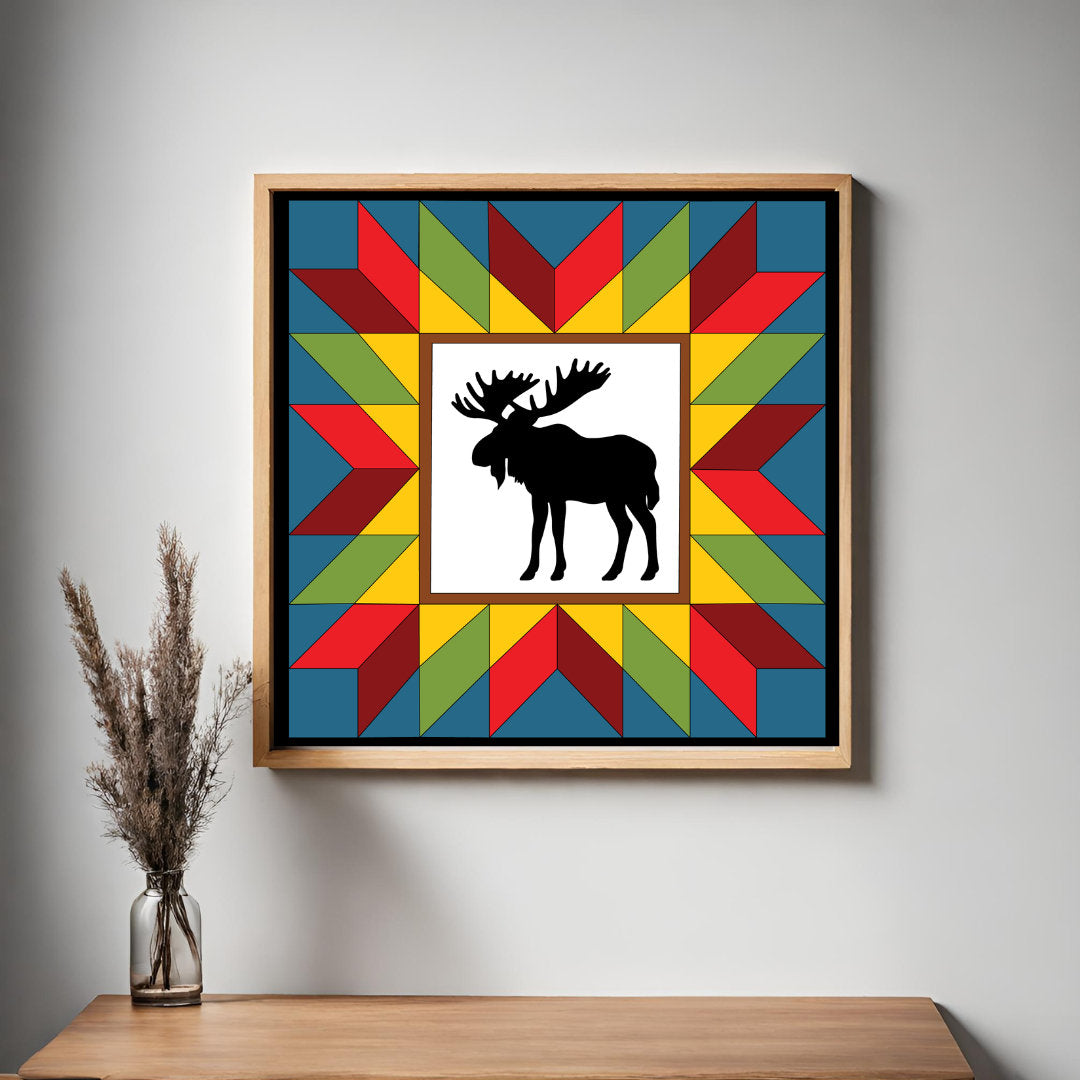 Moose in the Wild Barn Quilt Pattern displayed as framed farmhouse wall art in a modern living room. Printable digital download for DIY painted barn quilts.