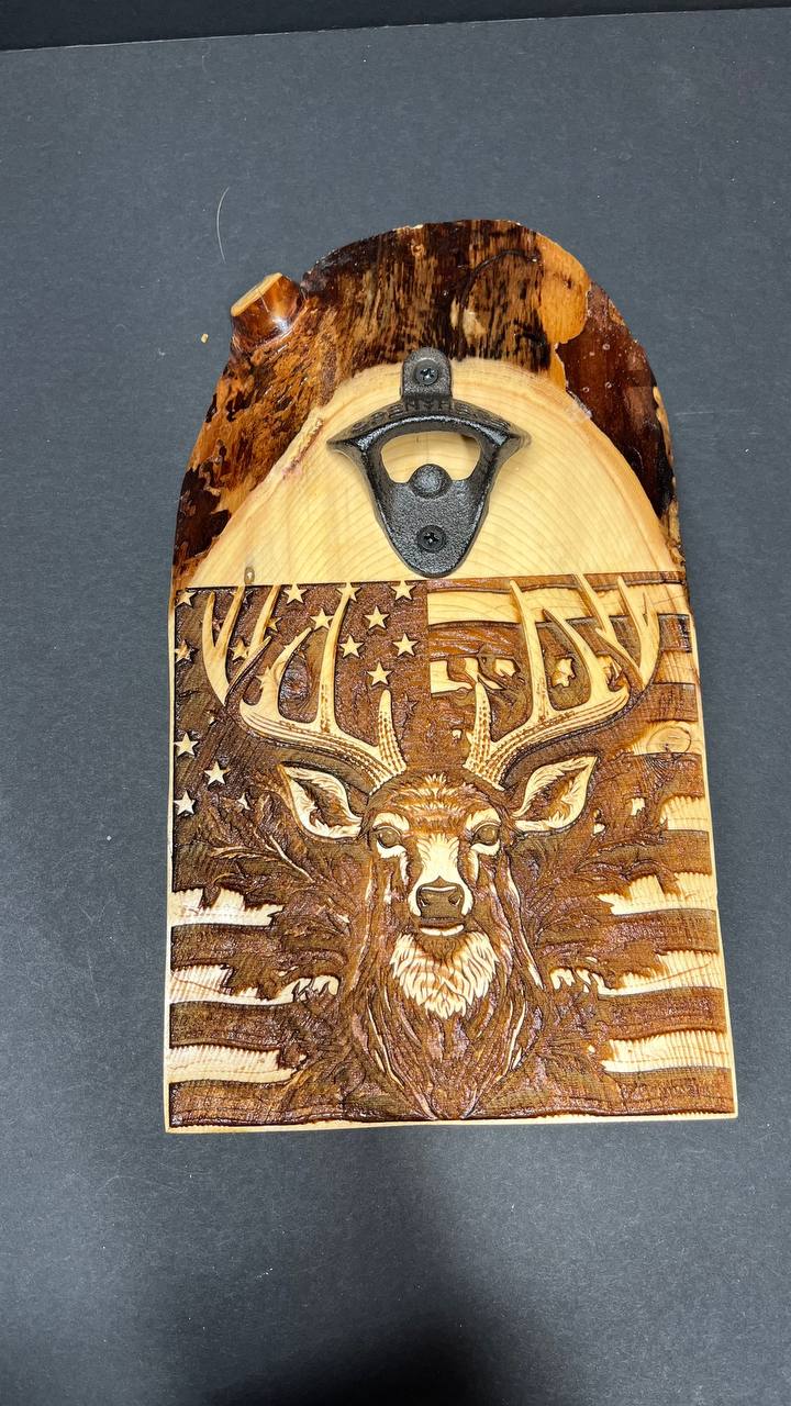 Wooden bottle opener with deer design on a dark background