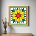 Framed Sunflower Barn Quilt Pattern displayed as colorful farmhouse wall art in a modern living room. Printable digital download for DIY painted barn quilts.