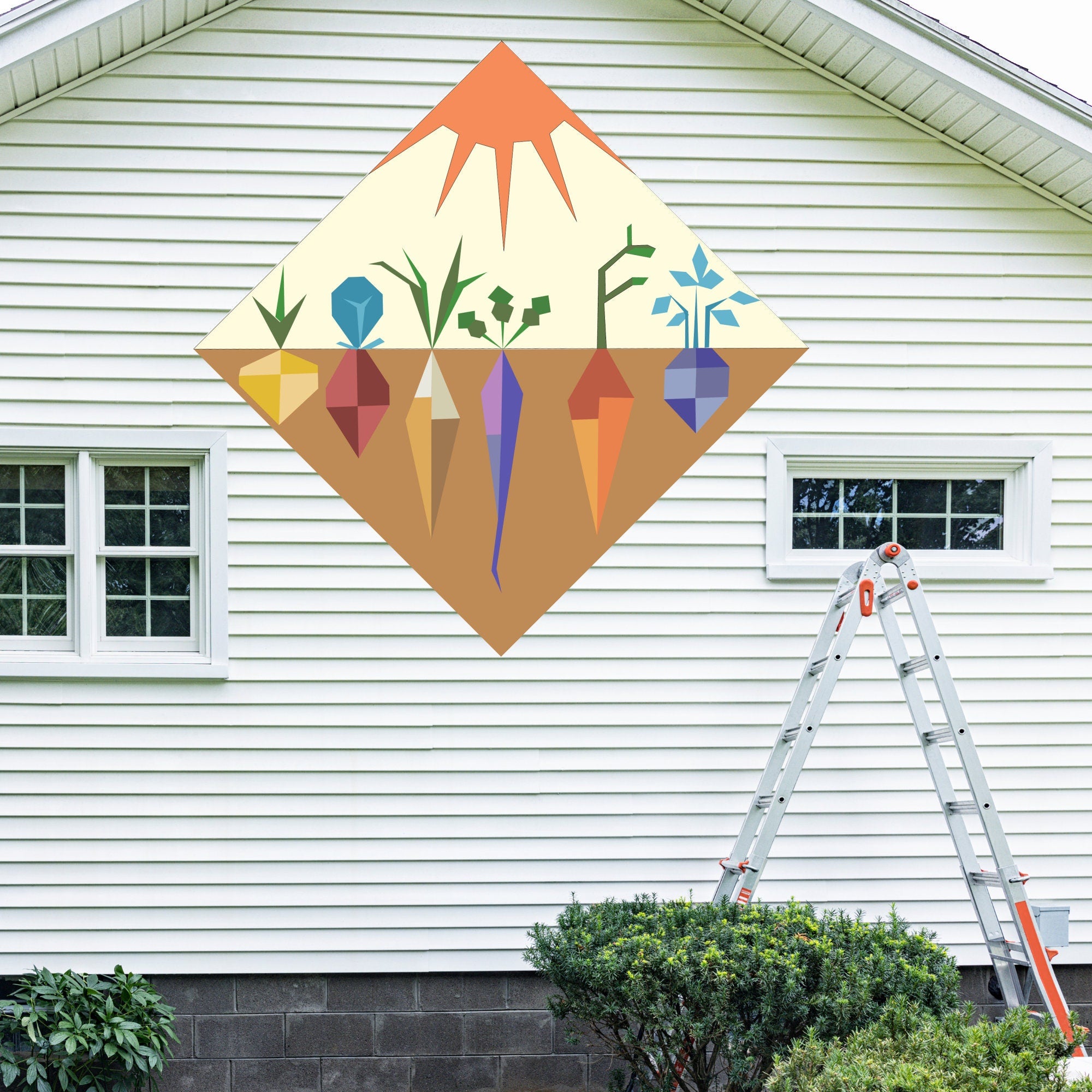 Veggie Garden Barn Quilt Pattern displayed on the exterior of a farmhouse, illustrating how the finished painted quilt block looks on a home.