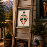 Yuletide Jewel printed Christmas barn quilt pattern featuring a geometric vintage ornament design in evergreen, cream, dusty blush and rich red for DIY painted barn quilts, Christmas wood signs, farmhouse holiday decor and handmade seasonal projects.
