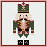 Nutcracker Christmas barn quilt pattern featuring a geometric holiday nutcracker in forest green, burgundy, blush pink, gold, cream and black. Printable DIY barn quilt design for painted wood signs, farmhouse Christmas decor, holiday wall art, porch decorations and handmade seasonal projects.
