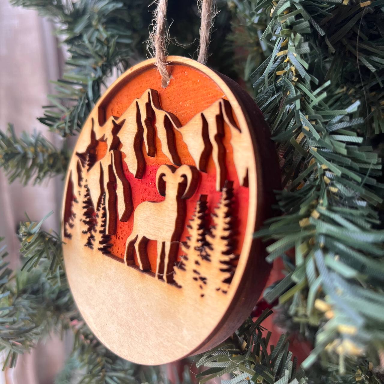 Mountain Goat Ornament – Bighorn Sheep Wooden Christmas Ornament – Nature-Inspired Outdoor Holiday Decor – Layered Sunset Forest Ornament 3.25"