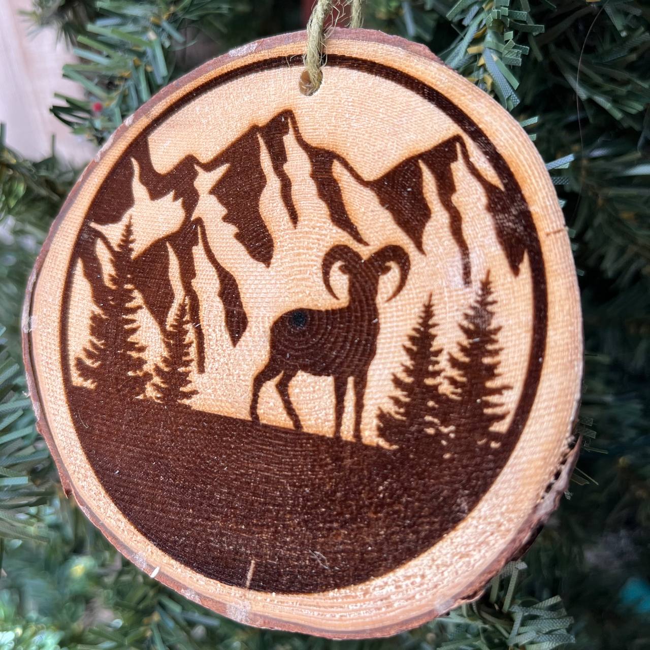 Mountain Goat Engraved Wood Slice Ornament – Locally Sourced Pine – Rustic Alpine Wildlife Decor – Nature-Inspired Tree Ornament 3.25"-4" Round