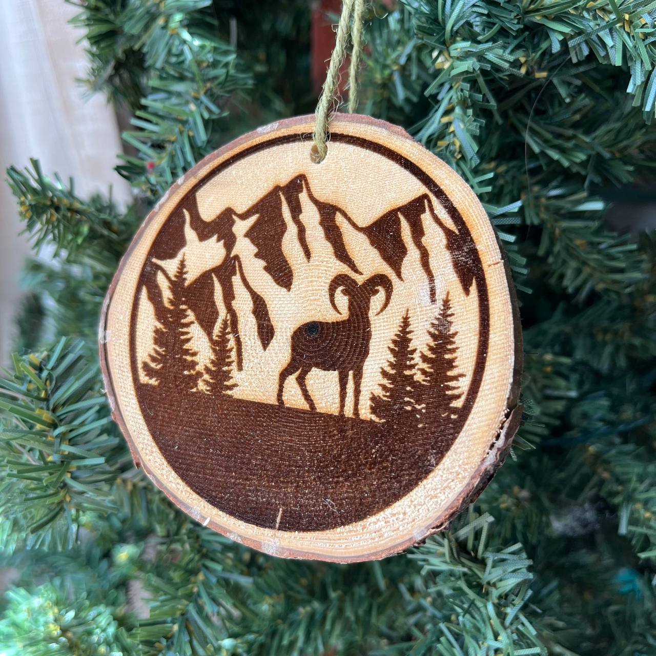 Mountain Goat Engraved Wood Slice Ornament – Locally Sourced Pine – Rustic Alpine Wildlife Decor – Nature-Inspired Tree Ornament 3.25"-4" Round