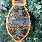 Feliz Navidad Christmas Ornament – Spanish Holiday Ornament | Rustic Wood and Resin Light Bulb Ornament with Snowflakes | Bilingual Tree Decor