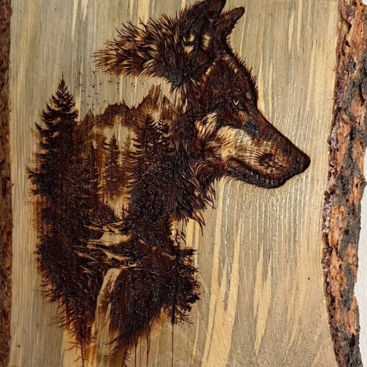 Wooden plaque with a wolf engraving on a plain background